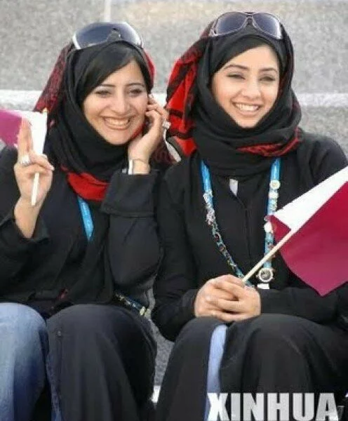 two muslimah girls are laughing 496x600 Two muslimah girls are laughing