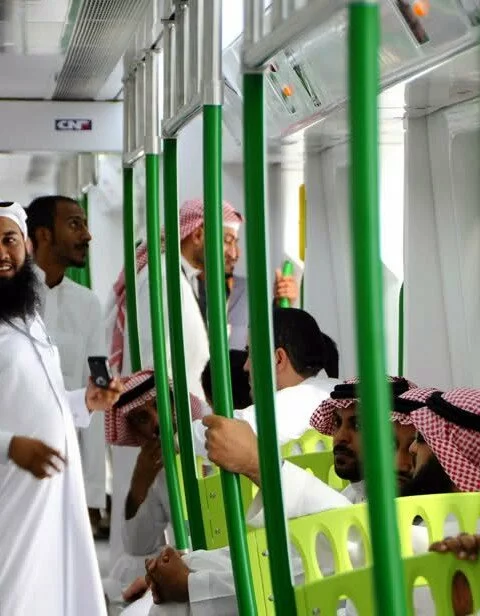 oi4okl 480x616 Saudi arabian men ride on the newly opened holy sites metro light rail in mecca