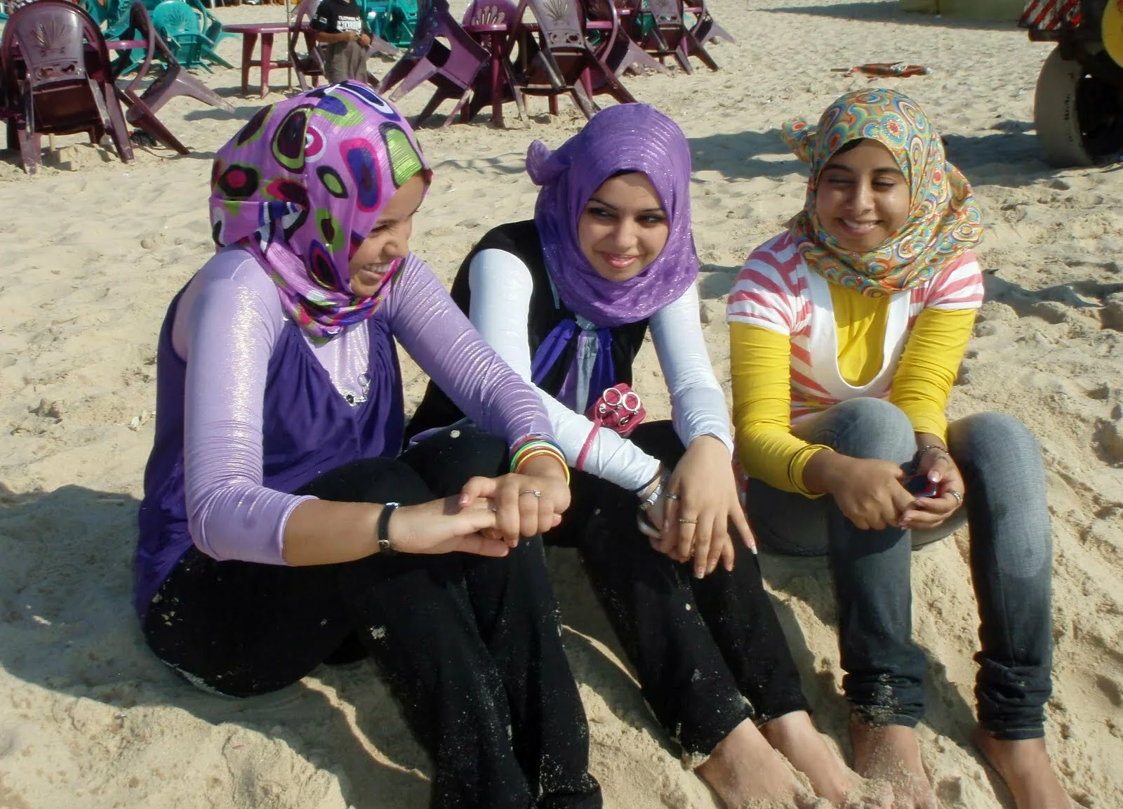 Muslim Girls sitting on Gaza's Joyous Beaches during d day