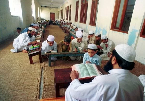 Students recite lines at a Madrassa in Pakistan Muslim Students recite lines at a Madrassa in Pakistan