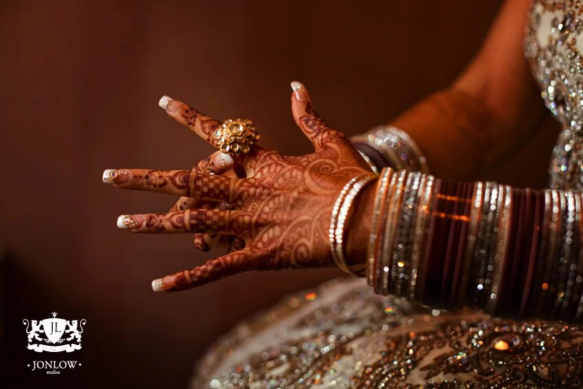 A very lovely bangles in bridal hands and bridal mehndi Beautiful wedding bangles, bridal wear photo gallery