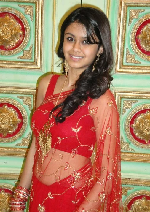 Beautiful and very charming Bangali girl in red saree