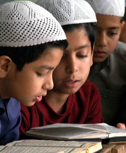 Muslim children readding Holy Quran Indian Muslim boys read Holy Quran