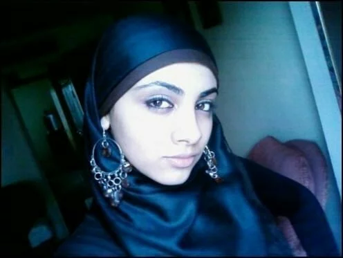 Muslim girl in blue hijab looking nice Muslim girl in blue hijab looking nice