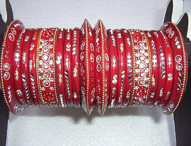 Red brass base lakh wedding bangles with best quality stones Beautiful wedding bangles, bridal wear photo gallery