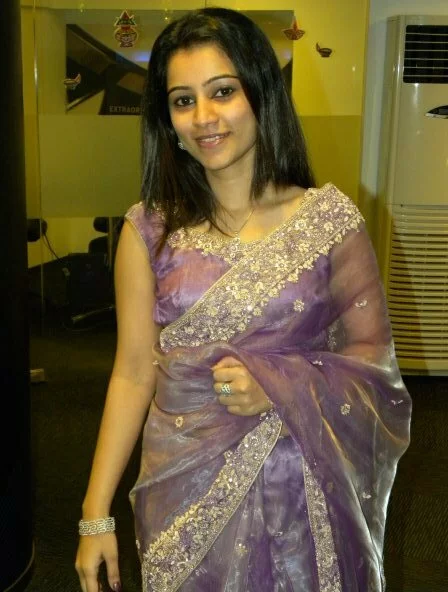 Sweet Bangali girl in beautiful purple saree