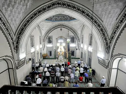 Macedonian Muslims pray at the Isa Beg Mosque in Skopje 1