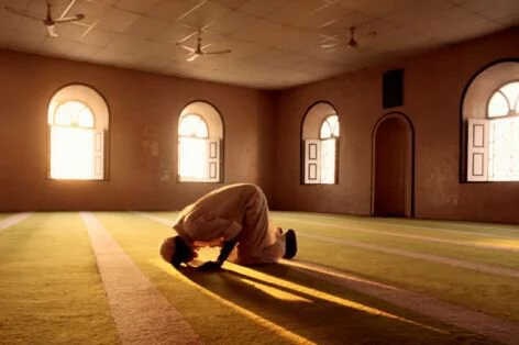 Muslim man prays in mosque