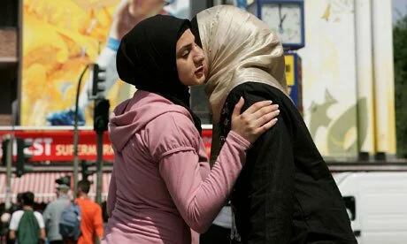 Two Muslim women greet each other in Berlin Two Muslim women greet each other in Berlin